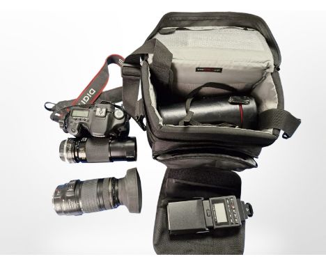 A Canon EOS 40D digital camera, No.DS126171, in camera bag with a Canon 70-300mm lens, Tamron 80-210mm CF tele macro lens, a 