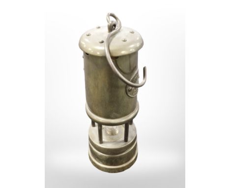 A Welsh brass musical miners lamp. 
