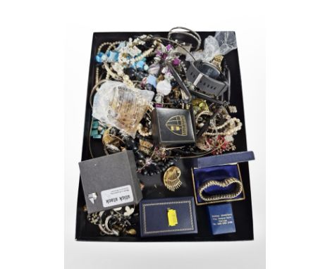 An assortment of costume jewellery, silver dress ring, wrist watch, simulated pearls etc 
