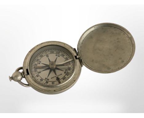 An American nickel-cased compass, possibly military.