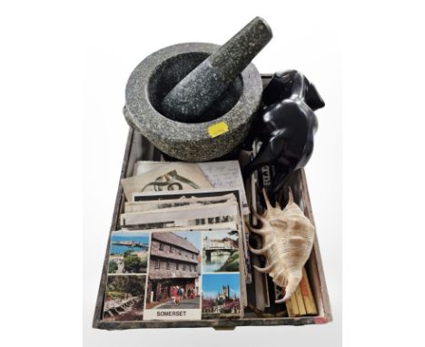 A granite pestle and mortar, sea shell, vintage Tom & Jerry pencils, postcards, etc 