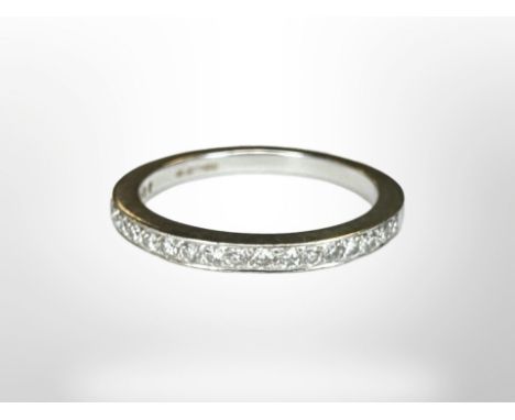 An 18ct gold diamond half eternity ring, with previous insurance valuation stating the total diamond weight to be 0.2ct, valu