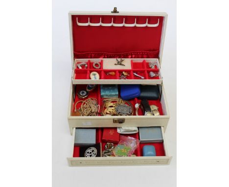 A box of contemporary and vintage costume jewellery.