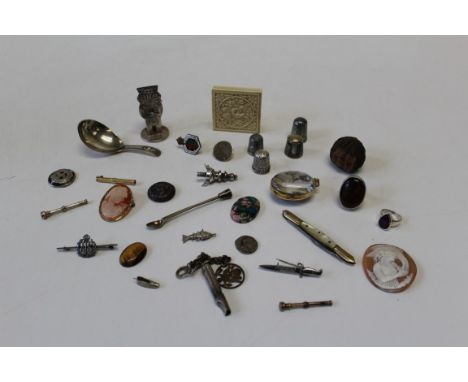 A George III silver caddy spoon with beaded handle, London 1804, three silver thimbles, a tortoiseshell and silver Engineers 