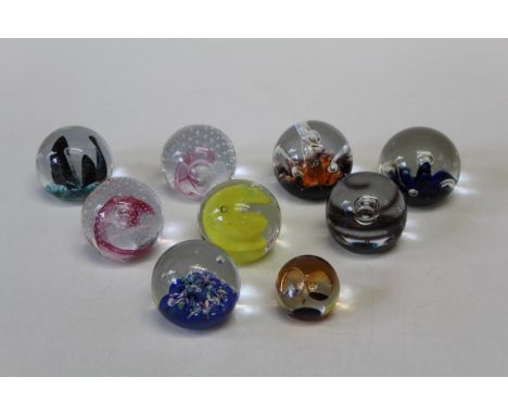 A Caithness Wise Owl paperweight, numbered 14071, 6cm diameter, together with eight further Caithness paperweights, including