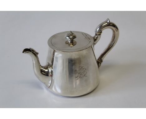 A Victorian sterling silver tea pot, marked for John Hunt & Robert Roskell, London, 1869, with Victoria duty mark. Featuring 
