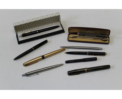 A boxed Parker fountain pen with 14ct gold nib, another gilt metal Parker fountain pen, a Mount Blanc fountain pen, two Parke