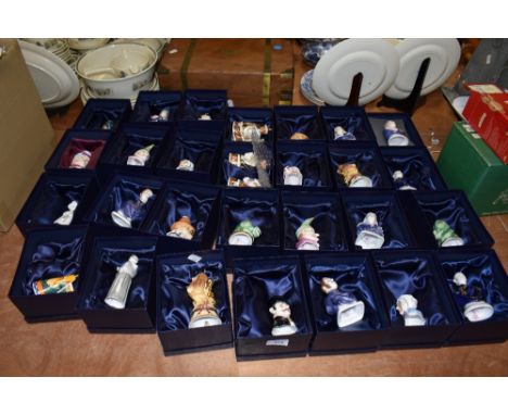 Thirty Royal Worcester candle snuffers, including Judy, Crocodile and Punch. All in good condition and boxed