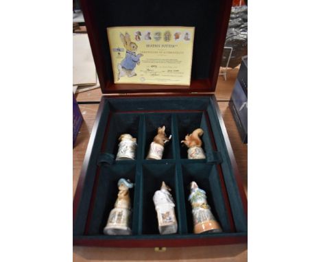 A Royal Worcester presentation box with six golden edition 100th anniversary celebration studies and display stand, limited s