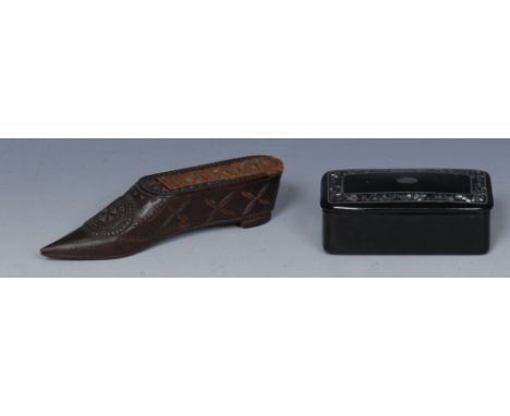 A 19th century chip-carved novelty snuff box, as a shoe, decorated overall with stylized geometric motifs, 10cm long, c. 1840