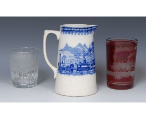 Railwayana - an early - mid-19th century Staffordshire jug, printed in flowing tones of blue with a train and carriages being
