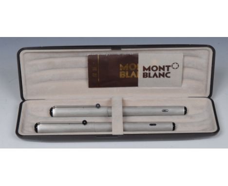A Mont Blanc Turbo fountain pen and stylus pen, engine turned stainless steel barrels and tops, cased en suite with internati