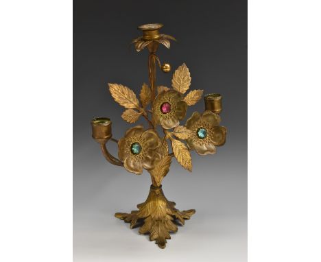 A 19th century gilt metal candelabra, as a spray of flowers, each set with a coloured paste stone, triform acanthus base, 31.