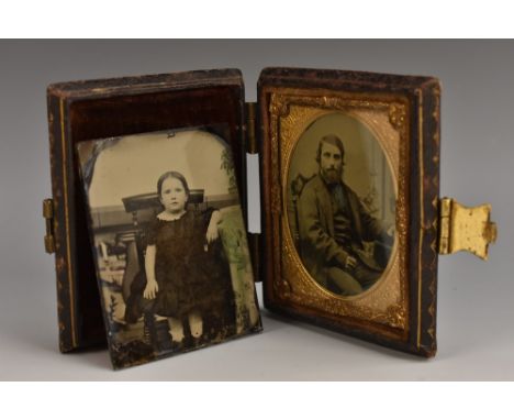 A Victorian ambrotype portrait,  of a seated gentleman, tooled and gilt leather case, 8cm x 6.5cm; another, of a young girl (