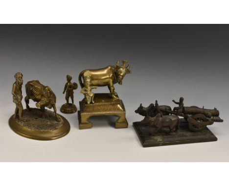 An Indian bronze model, of an ox drawn timber wagon, rectangular base, 14cm wide, early 20th century; etc (4)