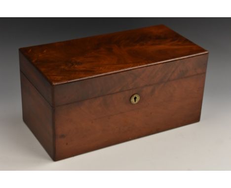 A George/William IV mahogany rounded rectangular tea caddy, hinged cover enclosing bowl aperture and a pair of canisters, mot