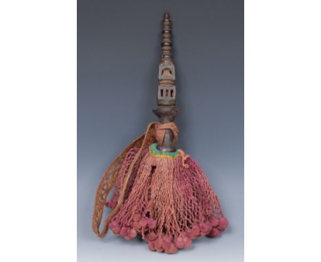 A South/Central American hide flask, lofty pierced and carved hardwood cresting, applied with a textile netted mount, 42cm lo