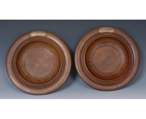 Treen - a pair of Welsh turned oak memorial chapel collection plates, each with brass plaque inscribed Er Cof Am Arnold Edwar