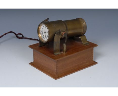 An early 20th century mahogany Loebl's patent night projection clock, 5cm diam, brass pivoting barrel with magnification lens