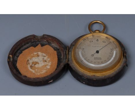 A 19th century gilt brass pocket barometer, 4.5cm circular silvered register inscribed A&N C.S.L, Westminster, curved mercury