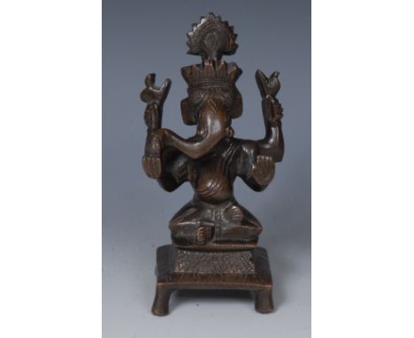 Indian School, a dark patinated bronze, of Ganesh, 12.5cm high, 
