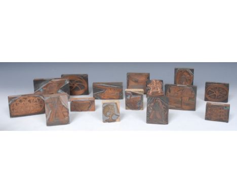 A collection of early 20th century copper printing blocks, each of the 48 blocks engraved with tools, machines and accessorie