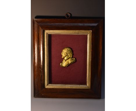 A 19th century gilt metal profile portrait plaque, 6.5cm x 5cm, rosewood frame