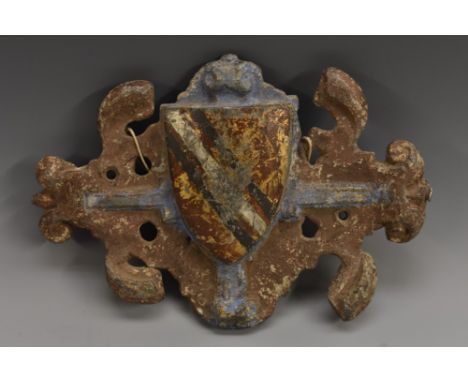 A 17th/early 18th century polychrome painted lead armorial plaque, probably Whitfield, 21cm wide, c.1680-1720