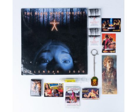 A fun collection of promotional items from the turn of the century. Includes 5 trading cards from the movie Orgazmo (1989), 2