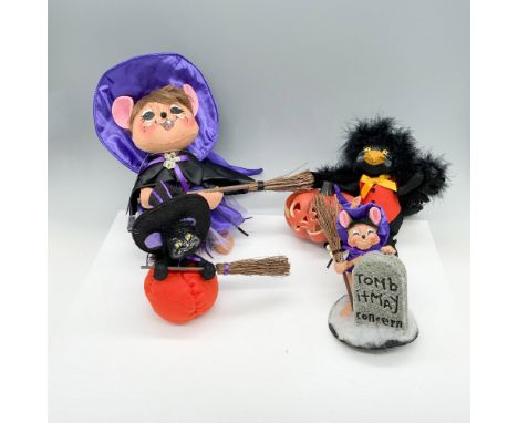 Enchanting collection of animals that includes a large mouse with a purple gown and broomstick, a small mouse with a tombston