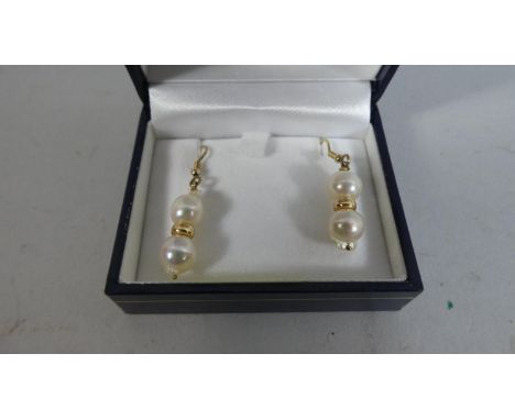 A Pair of 9ct Gold and Cultured Pearl Earrings 