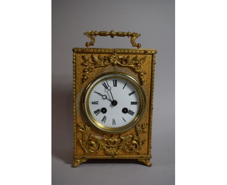 A French Gilt Metal Carriage Clock with Ormolu Spandrels, the Movement Striking on a Bell, Working Order, 23cm High 