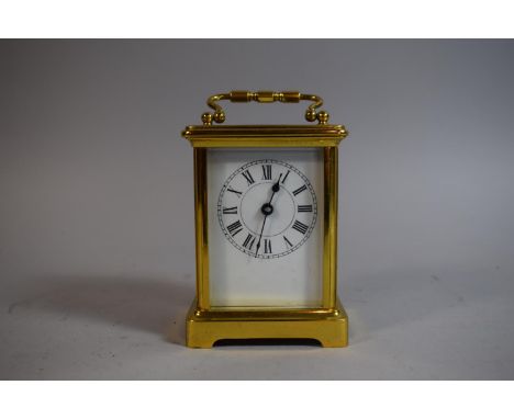 A French Brass Cased Carriage Clock with White Enamelled Dial, Movement Working, 12cm High 