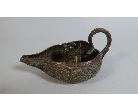 A Indo-Persian Candle Stick/Chamber Stick with Serpent handle and intricate Ornate Foliate and Stem Decoration to Body 