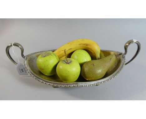 An Oval Silver Plated Two Handled Bowl Containing Ceramic Fruit 