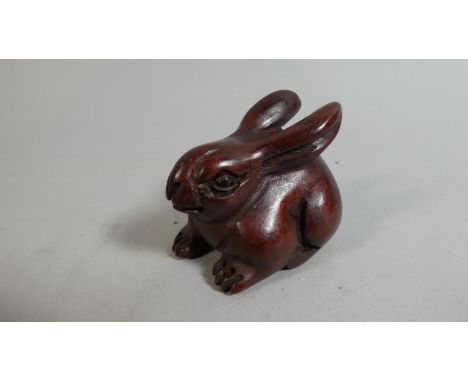 An Wooden Netsuke in the form of a Hare 
