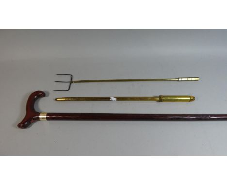 A Brass Poker, Brass Toasting Fork and a Walking Stick 