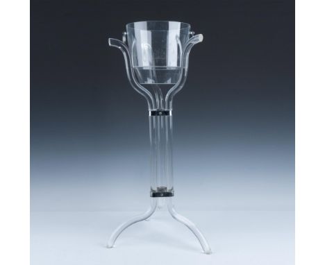 This bucket has two silver tone ring handles, with dimensions of 9"dia x 8"H. This item has a three leg lucite base with stai