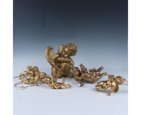Amazing collection of winged angels that includes a large sitting statuette of a sleeping child with a felt bottom, a large o