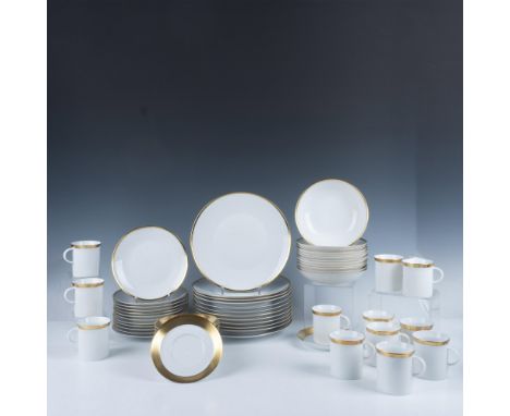 This German Porcelain Kurfuerstendamm 4001 set features a sophisticated gold rim design. Includes 12 dinner plates (10.25" di