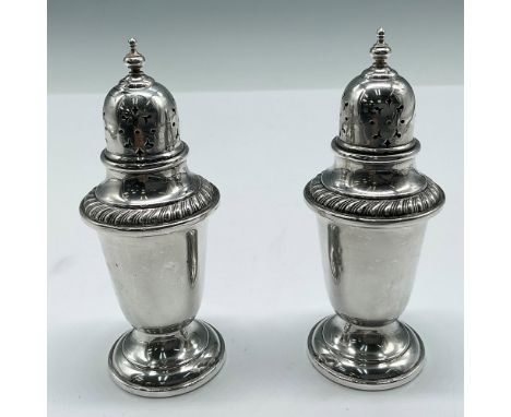 Unique footed design with thimble pierced top and embossed banded rim. Gorham Sterling engraved mark. 82g. Issued: 20th centu