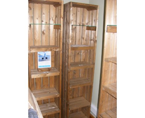 A similar five shelf pine display unit with plate glass shelf to the top