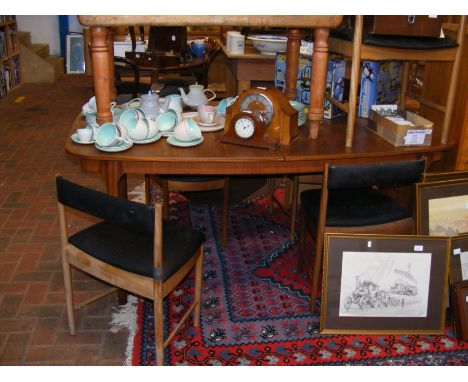 A vintage mid century Mackintosh extending dining table with six (4+2) chairs