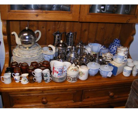 A selection of ceramic and metal tea and tableware 