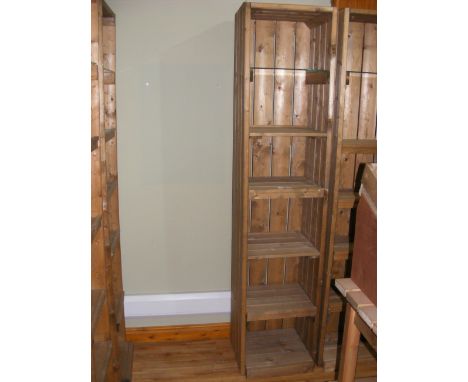 A similar pine five shelf display unit with plate glass shelf to the top