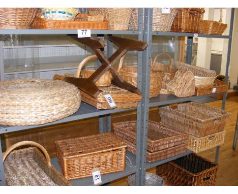 Assorted canework items including baskets, table stand etc.(all of the contents of the middle shelf)
