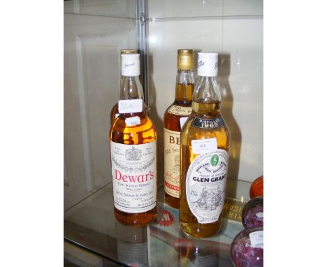A Glenn & Grant Highland Malt Scotch Whisky, together with a Dewar's and two Bell's