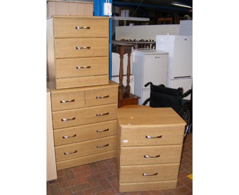 Three light oak veneered chests of drawers with chrome handles 