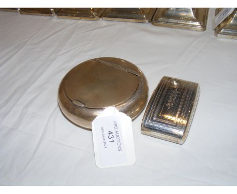 A silver circular tobacco box, together with a curved silver snuff box