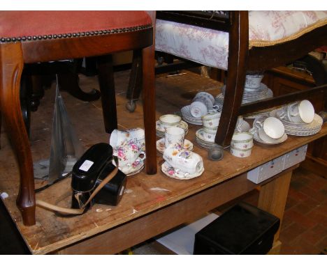 A selection of Royal Stafford, Royal Crown Derby and Limoges tea ware, together with vintage camera and metal sailing boat mo
